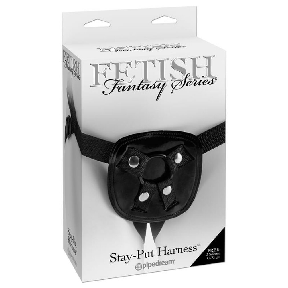 Weiße Produktbox für Stay-Put Harness mit schwarzem Geschirr und einem zentralen Ring.