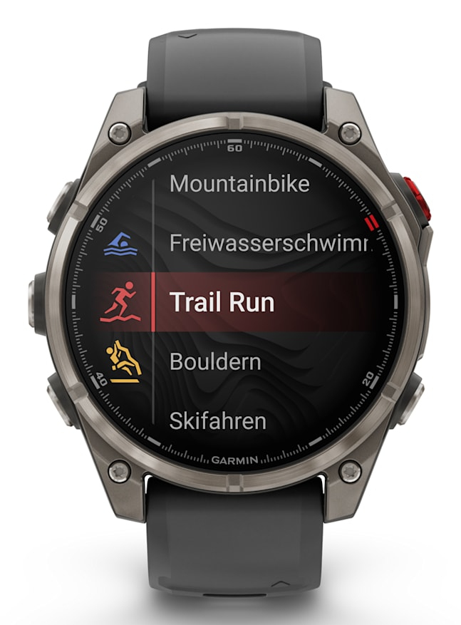 A smartwatch screen showing sports modes like Mountainbike and Trail Run with a highlighted red selection.
