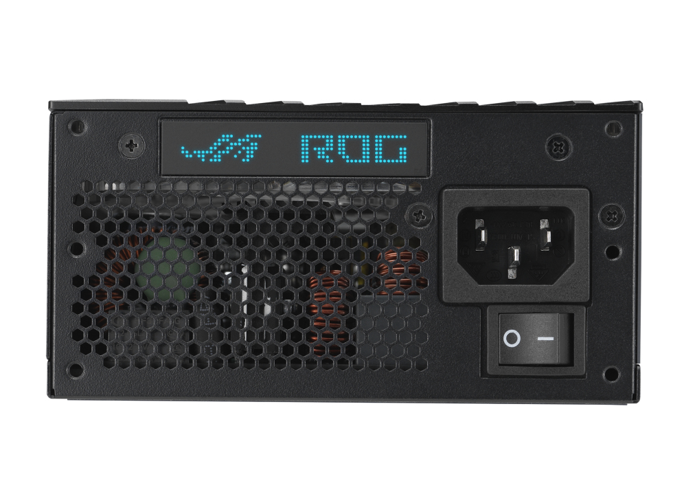A black power supply unit with a blue ROG display, honeycomb mesh vent, power socket, and a rocker switch.