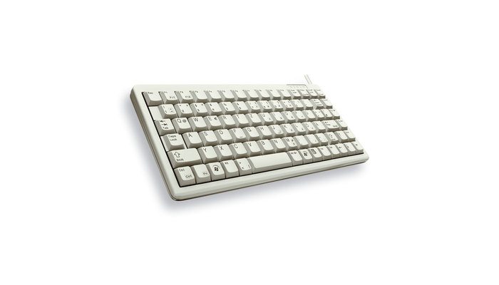 A compact beige computer keyboard with a QWERTZ layout, angled on a white background.