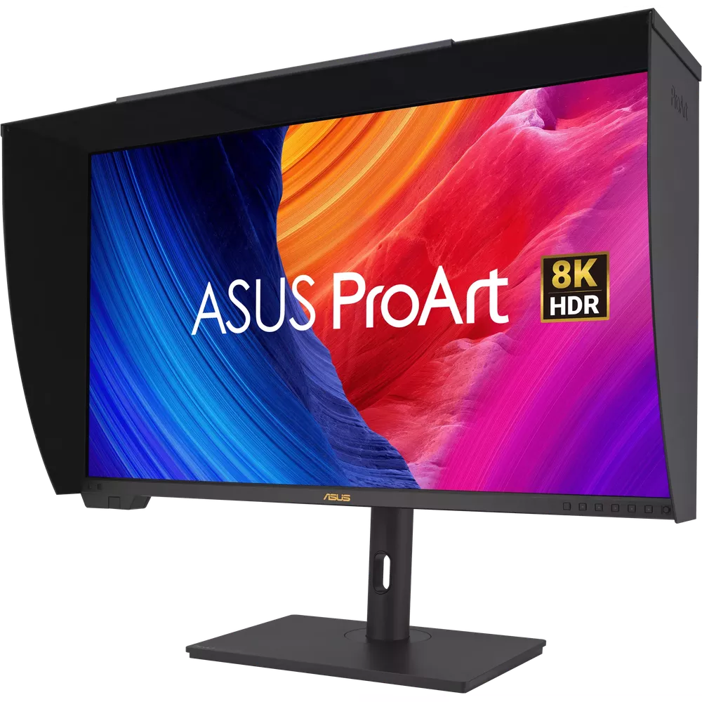 ASUS ProArt 8K HDR monitor with a hood on a black stand displaying colorful abstract imagery.