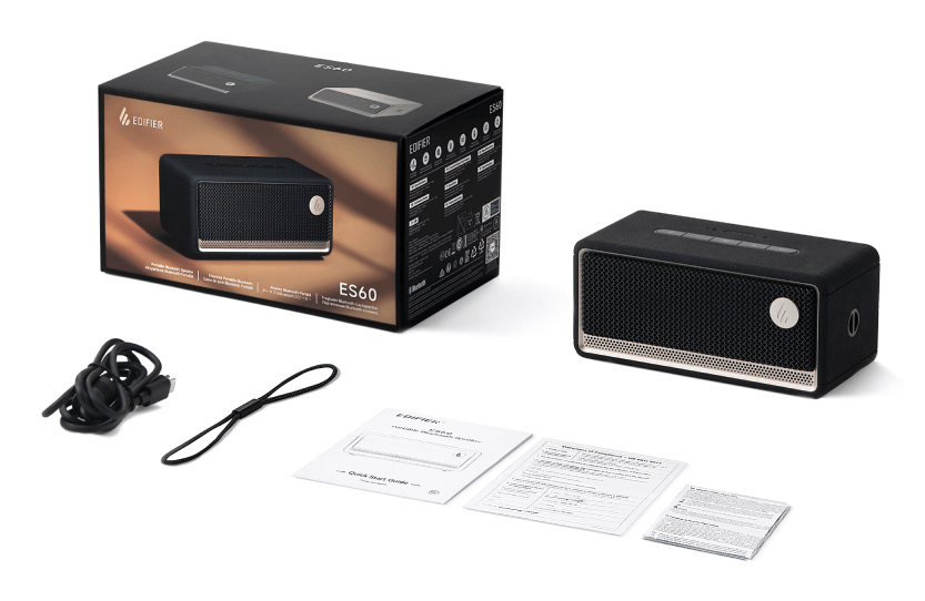Przenośny głośnik Bluetooth Edifier ES60 z pudełkiem, kablem ładującym, paskiem i instrukcjami na białym tle.