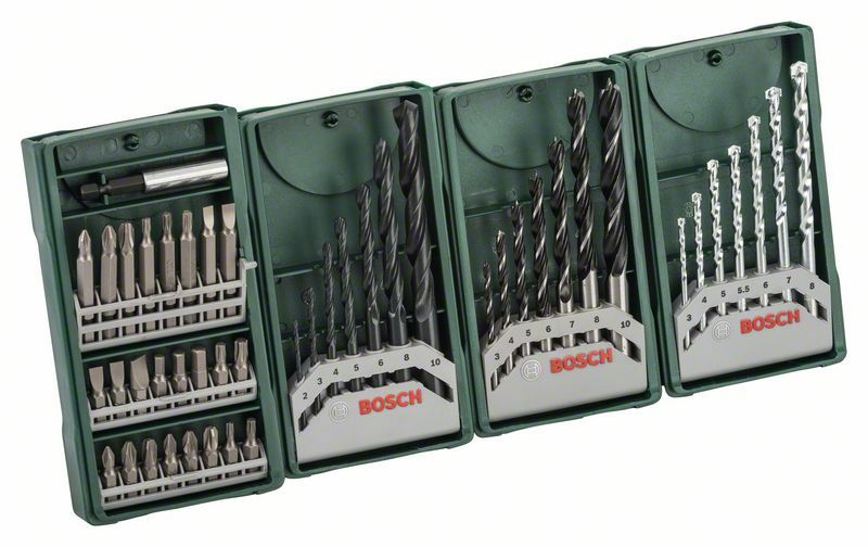 Una custodia verde aperta contenente varie punte da trapano e inserti Bosch disposti in supporti.