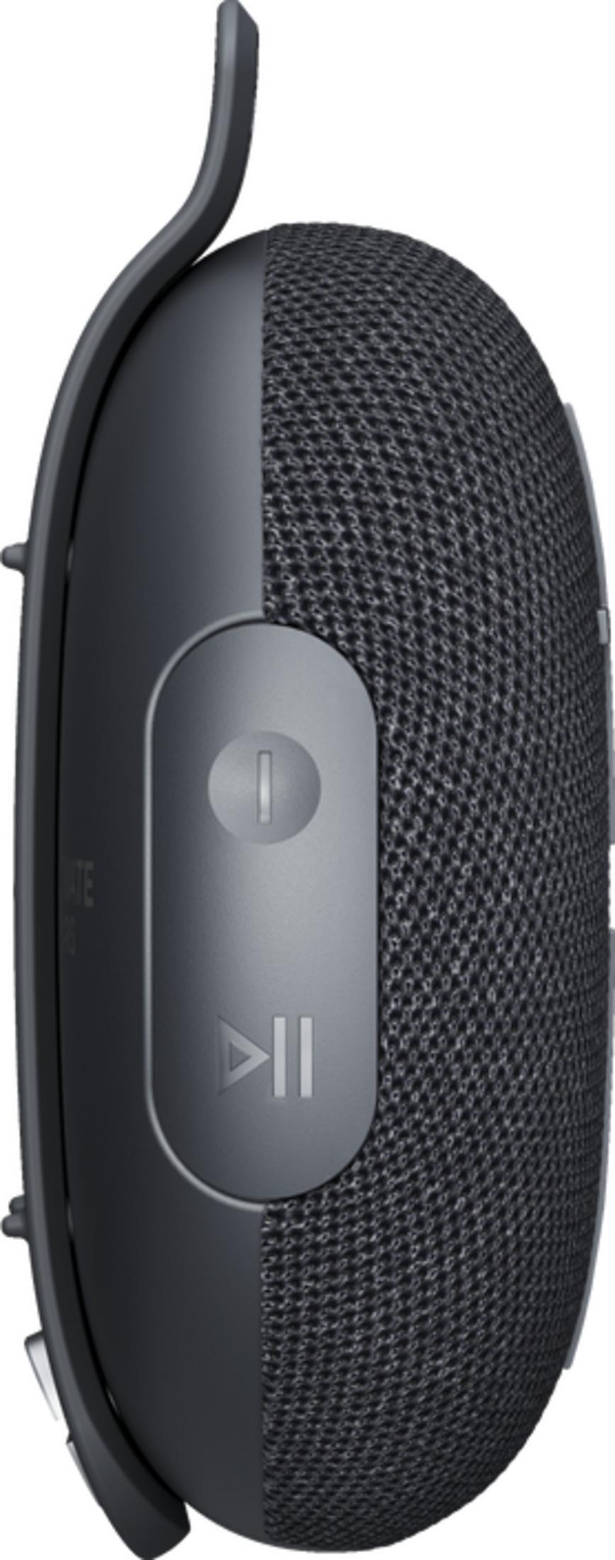 Side view of a dark gray portable speaker with volume and play buttons and a hanging strap.