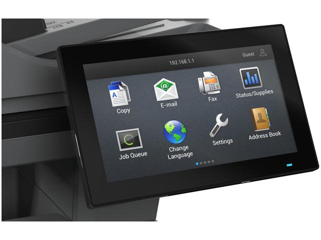 Un pannello di controllo touch screen nero su una stampante che mostra icone come copia, email, fax e impostazioni.