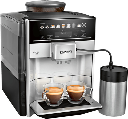 Moderna macchina da caffè automatica Siemens con contenitore per latte e due tazze di espresso.