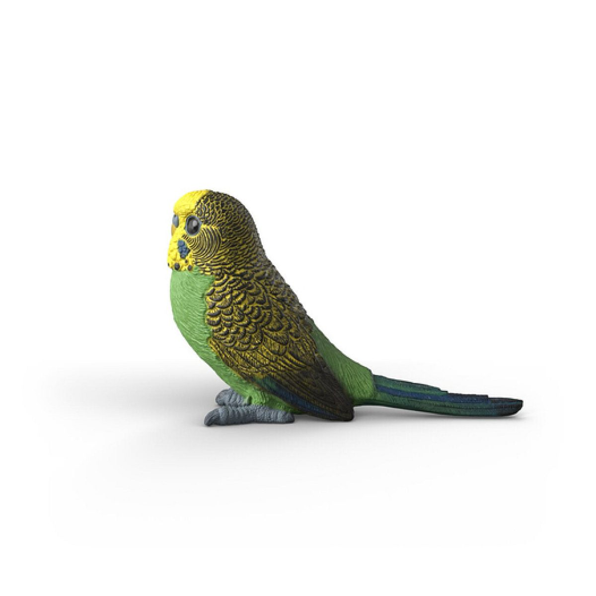 Una estatuilla de un periquito verde y amarillo sobre superficie blanca.