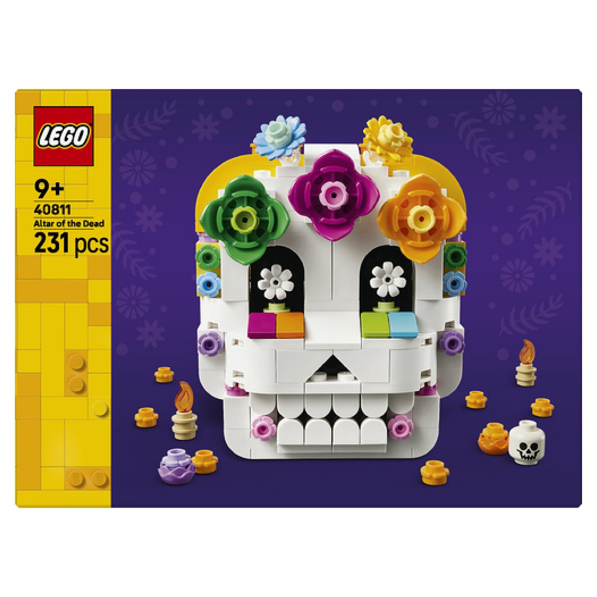 Lego Ölüler Sunağı seti, renkli çiçekler, mumlar ve küçük parçalarla süslenmiş beyaz bir kafatası gösteriyor.