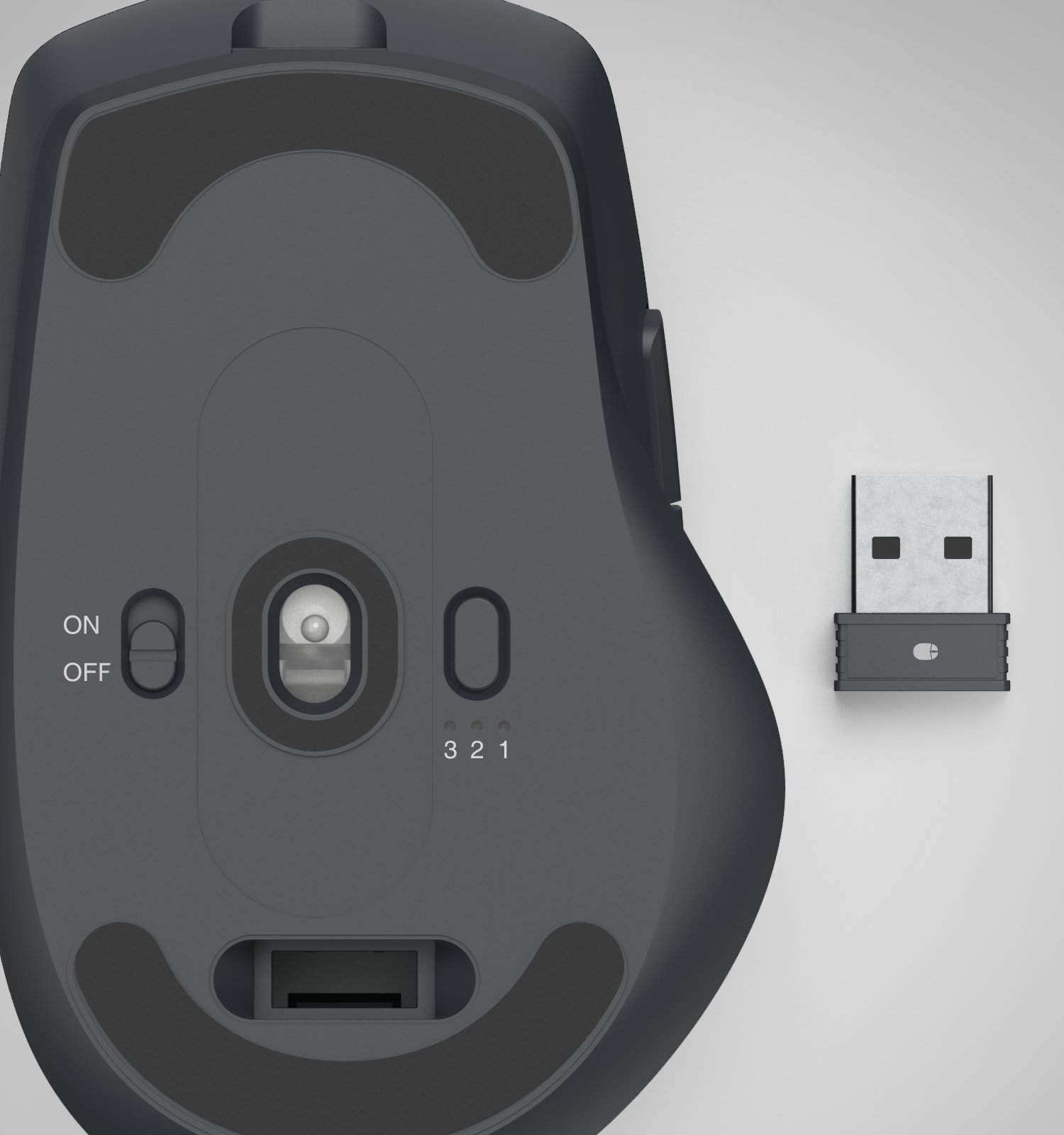Die Unterseite einer schwarzen kabellosen Maus mit Ein-Aus-Schalter und einem USB-Empfänger daneben.