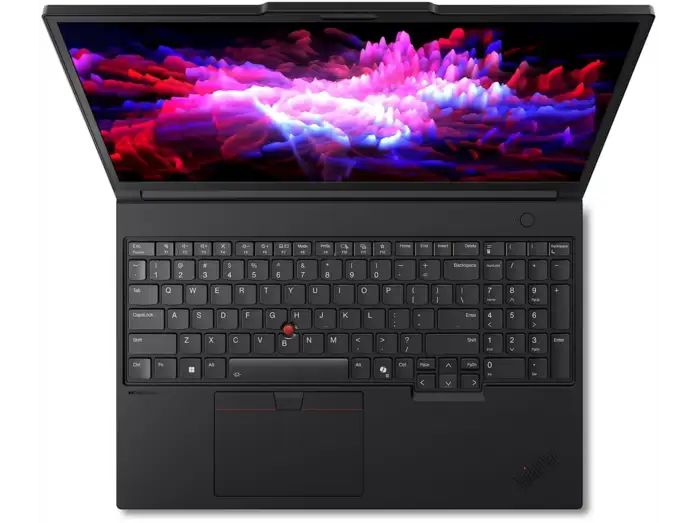 Vista dall'alto di un laptop nero con uno sfondo astratto colorato e tastierino numerico.