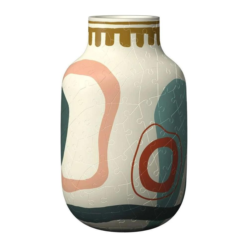 Eine dekorative Vase aus Puzzle-Teilen mit abstrakten rosa und blauen Mustern.