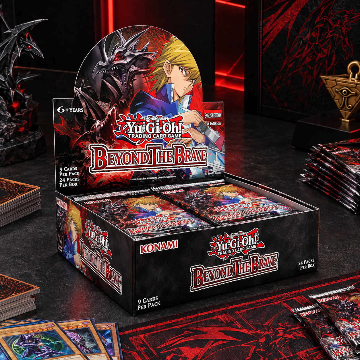 Yu-Gi-Oh! "Beyond the Brave" Booster-Box auf einem Tisch, umgeben von Kartenstapeln und Tütchen.