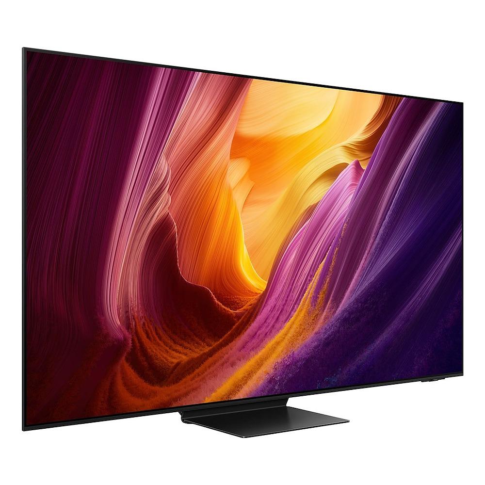 Telewizor z płaskim ekranem i kolorowym abstrakcyjnym obrazem na ekranie na stole.