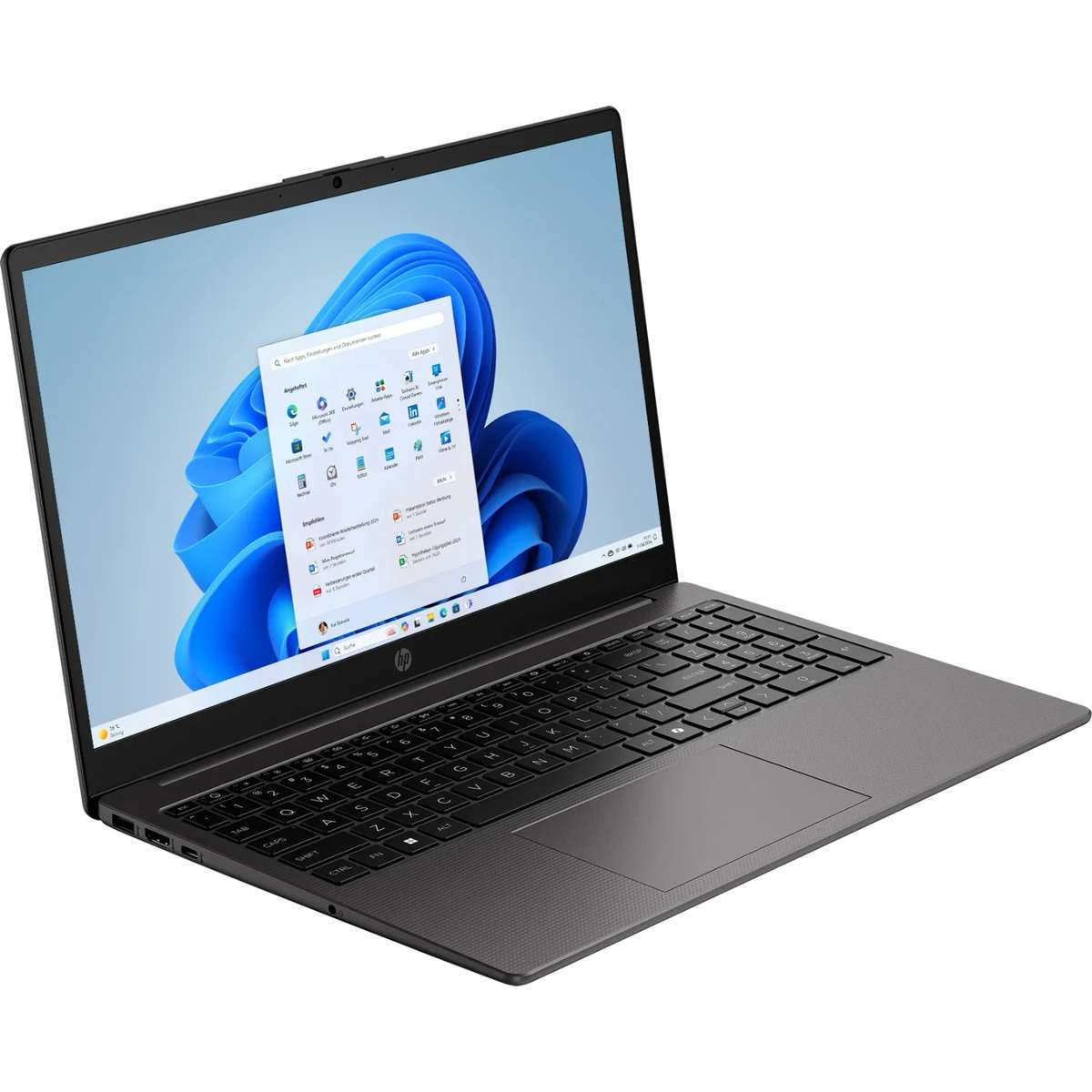 Ein grauer Laptop mit geöffnetem Bildschirm zeigt ein blaues Windows 11-Hintergrundbild und Startmenü.