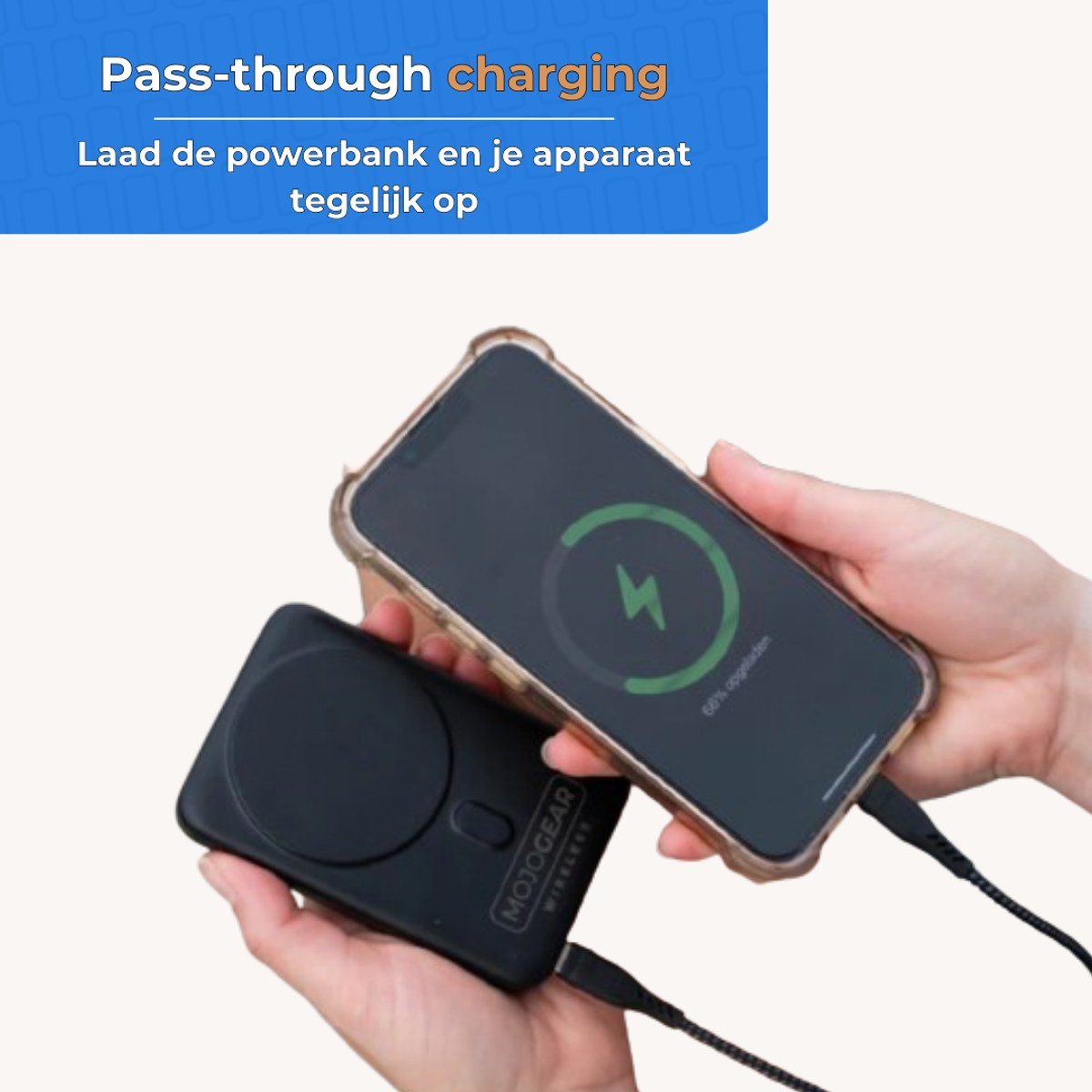 Hands holding a power bank and a smartphone charging simultaneously with cables.