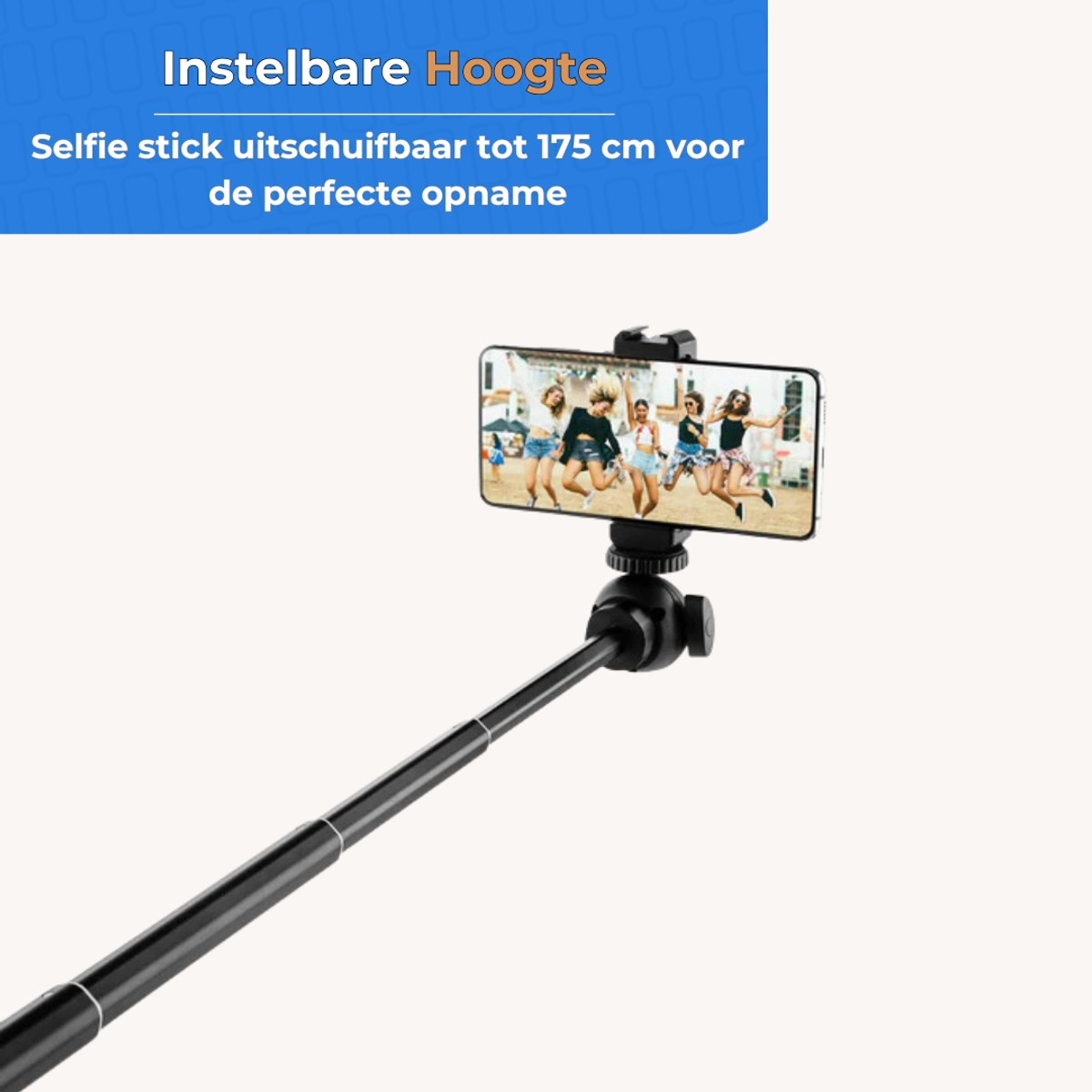 Black selfie stick holding a smartphone displaying a group of jumping women at a beach.