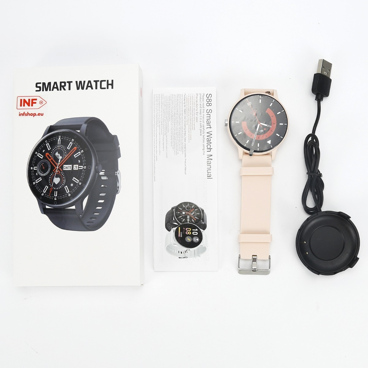 Smartwatch con scatola, manuale, cinturino rosa e cavo di ricarica nero su sfondo bianco.