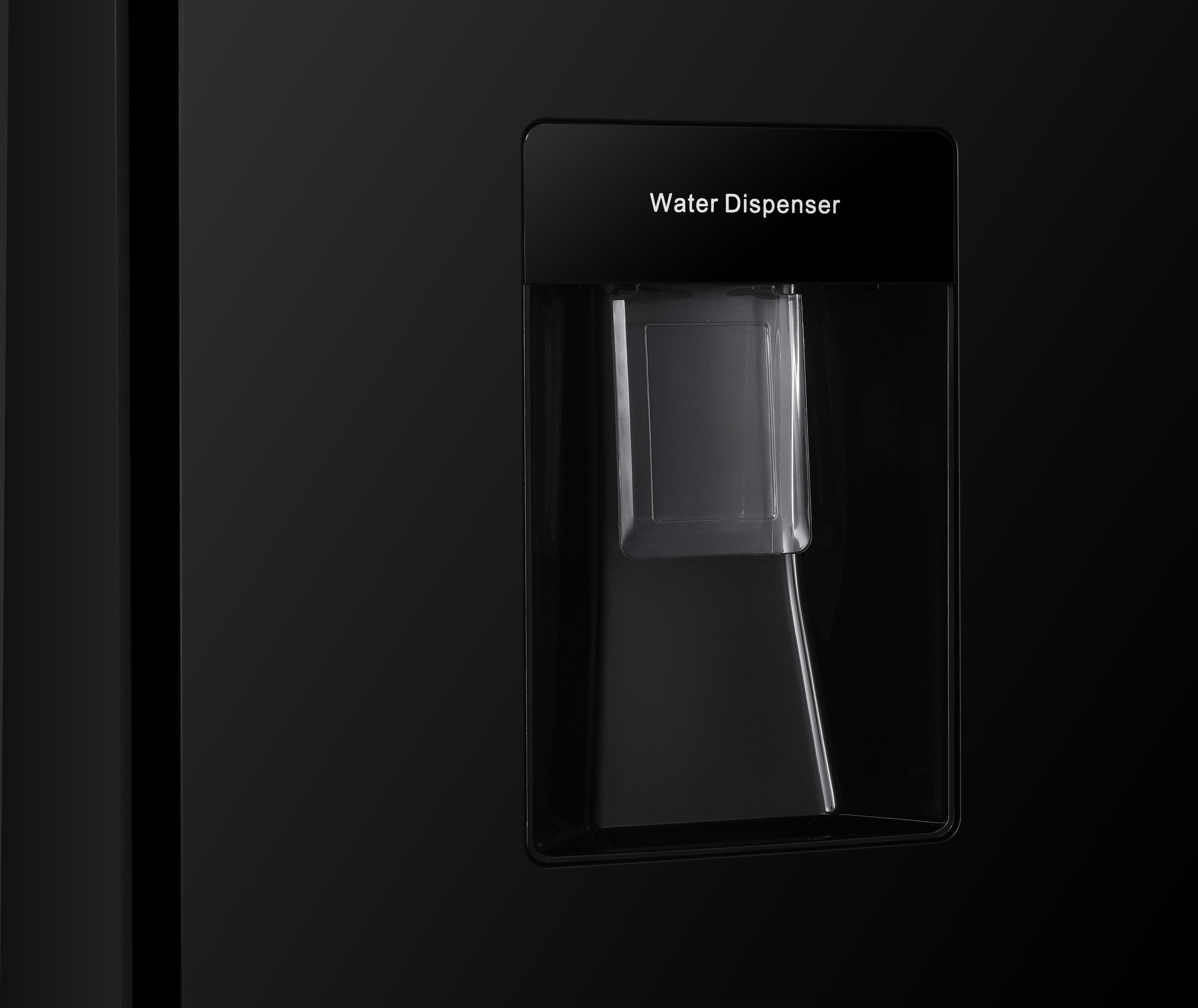 A modern black water dispenser with a glossy finish and white text on a refrigerator door.