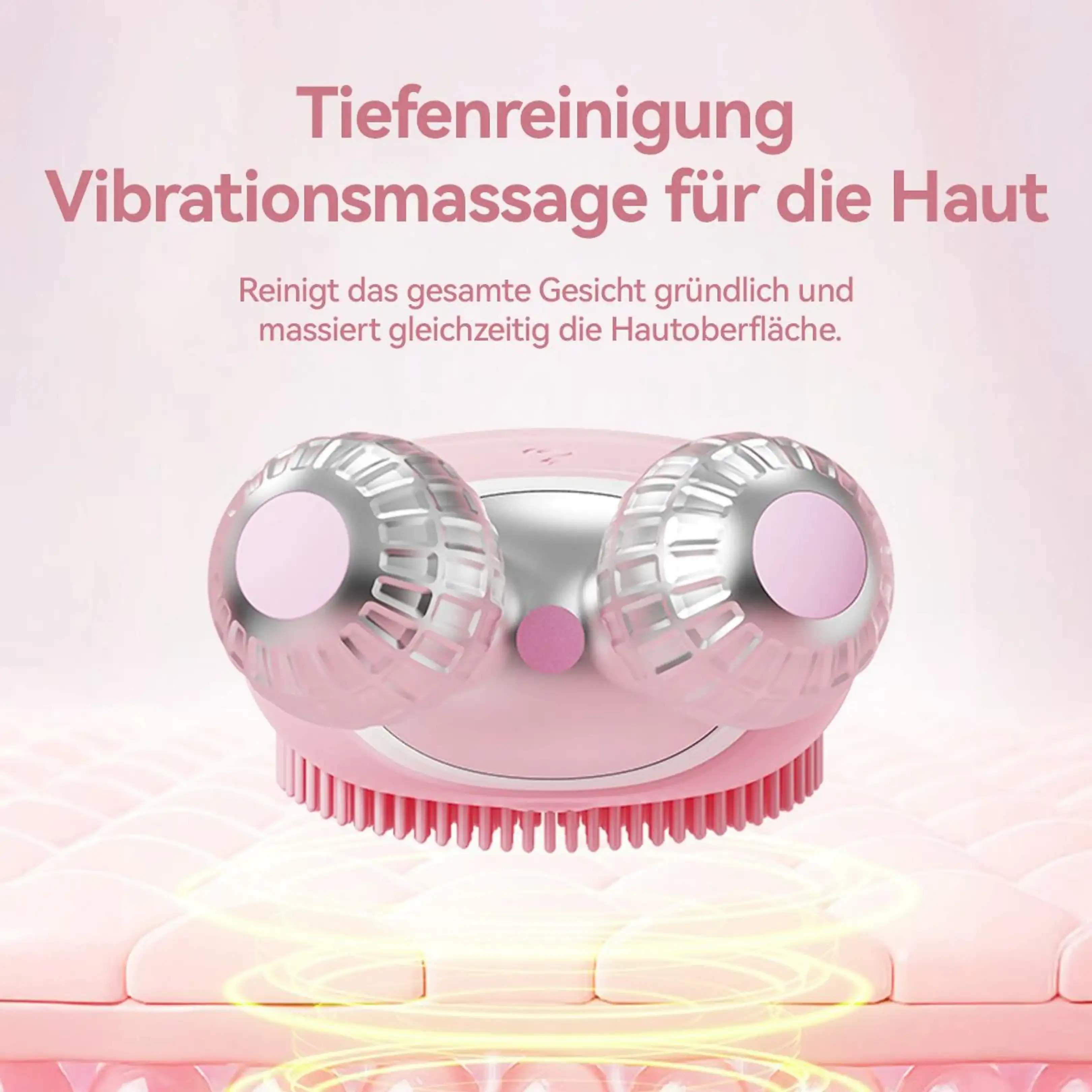 Rosa Gesichtsreinigungsgerät mit Silikonborsten und zwei rotierenden Köpfen auf pinkem Hintergrund.