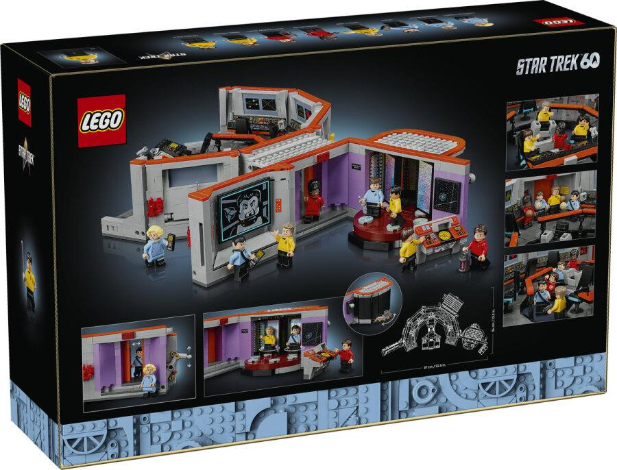 Siyah arka planda detaylı uzay gemisi içi ve minifigürler gösteren Lego Star Trek set kutusu.
