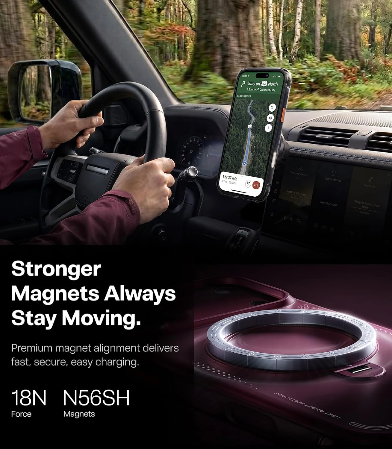 Smartphone mit Navigation am Autolüftungsgitter befestigt, unten eine rot-violette Magnethülle.