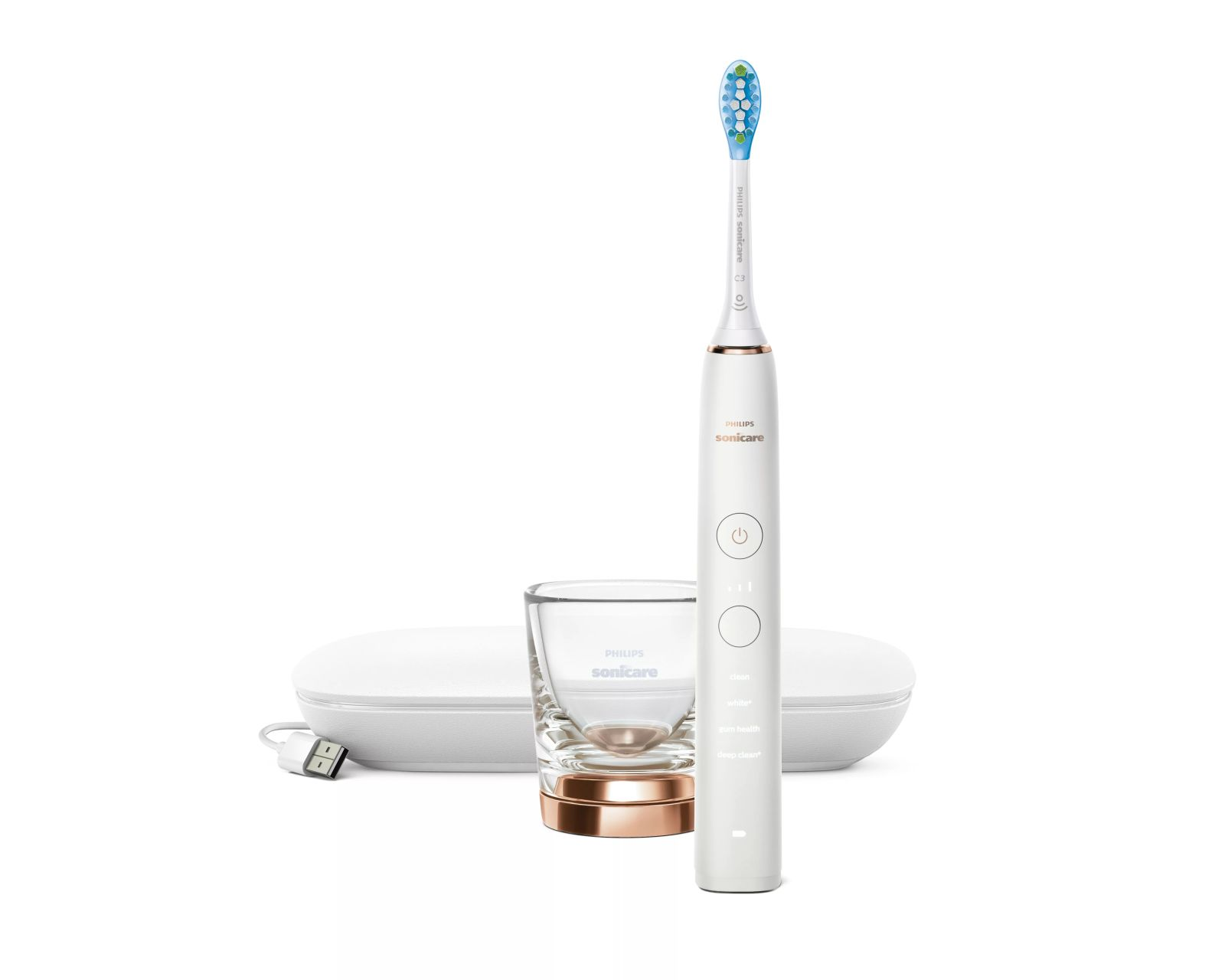 Uno spazzolino elettrico Philips Sonicare bianco accanto a un bicchiere di ricarica e custodia.