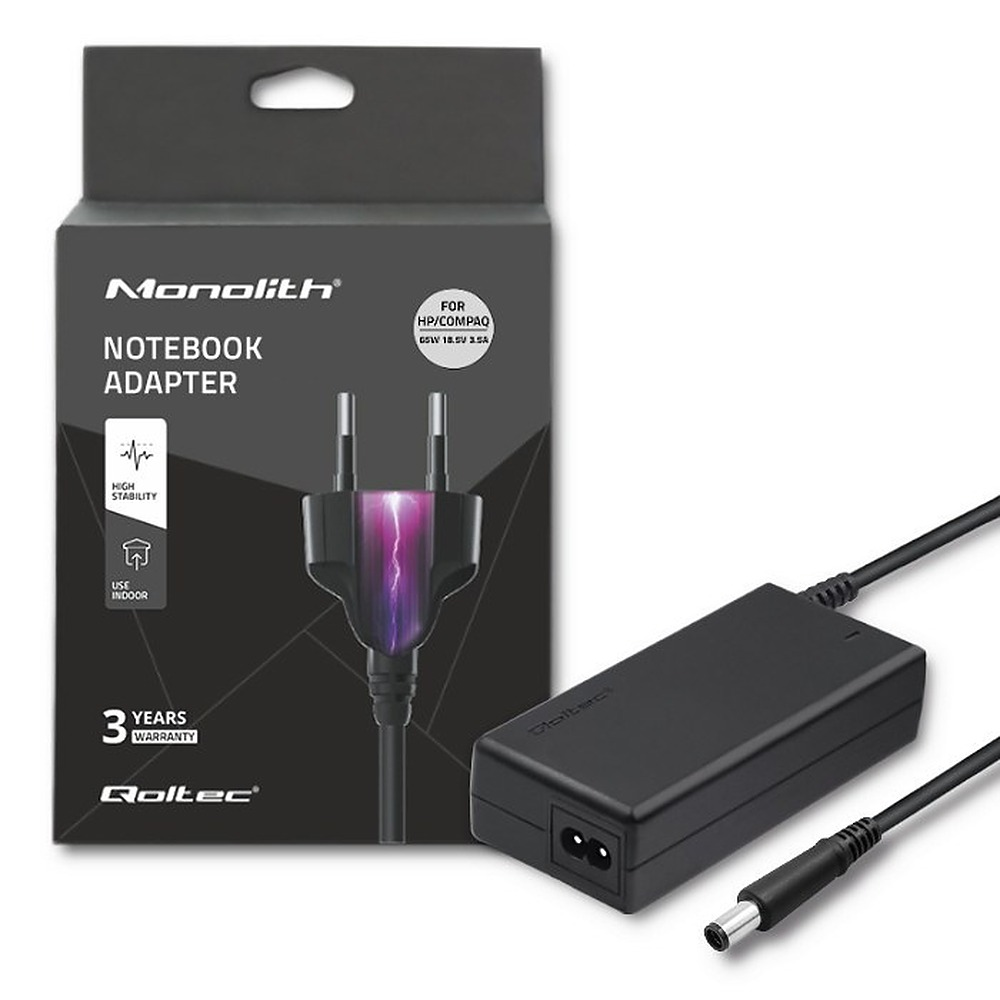 Black Monolith notebook adapter shown with its retail packaging and power cable.