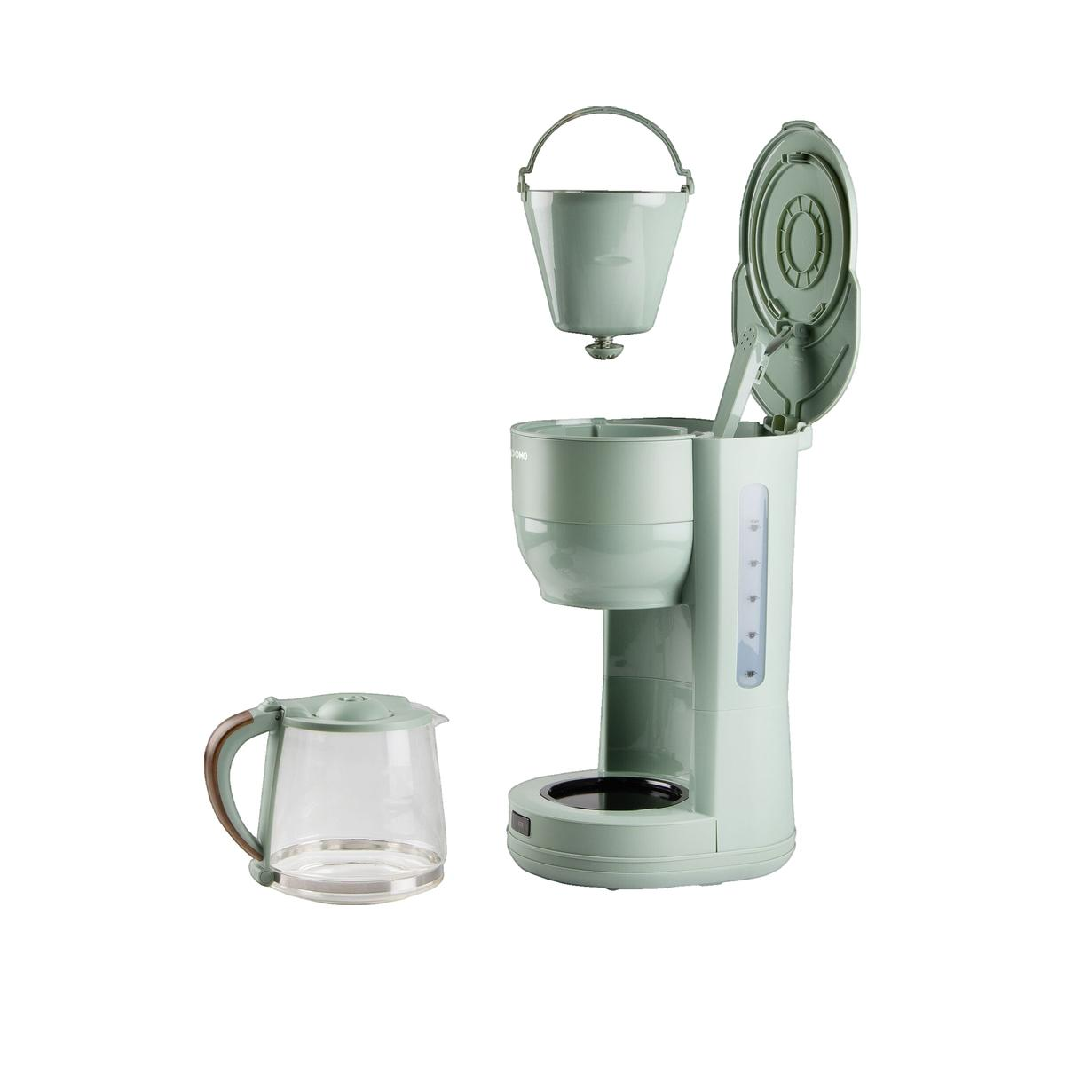 Grüne Kaffeemaschine mit abnehmbarem Filter und Glaskanne auf weißem Hintergrund.