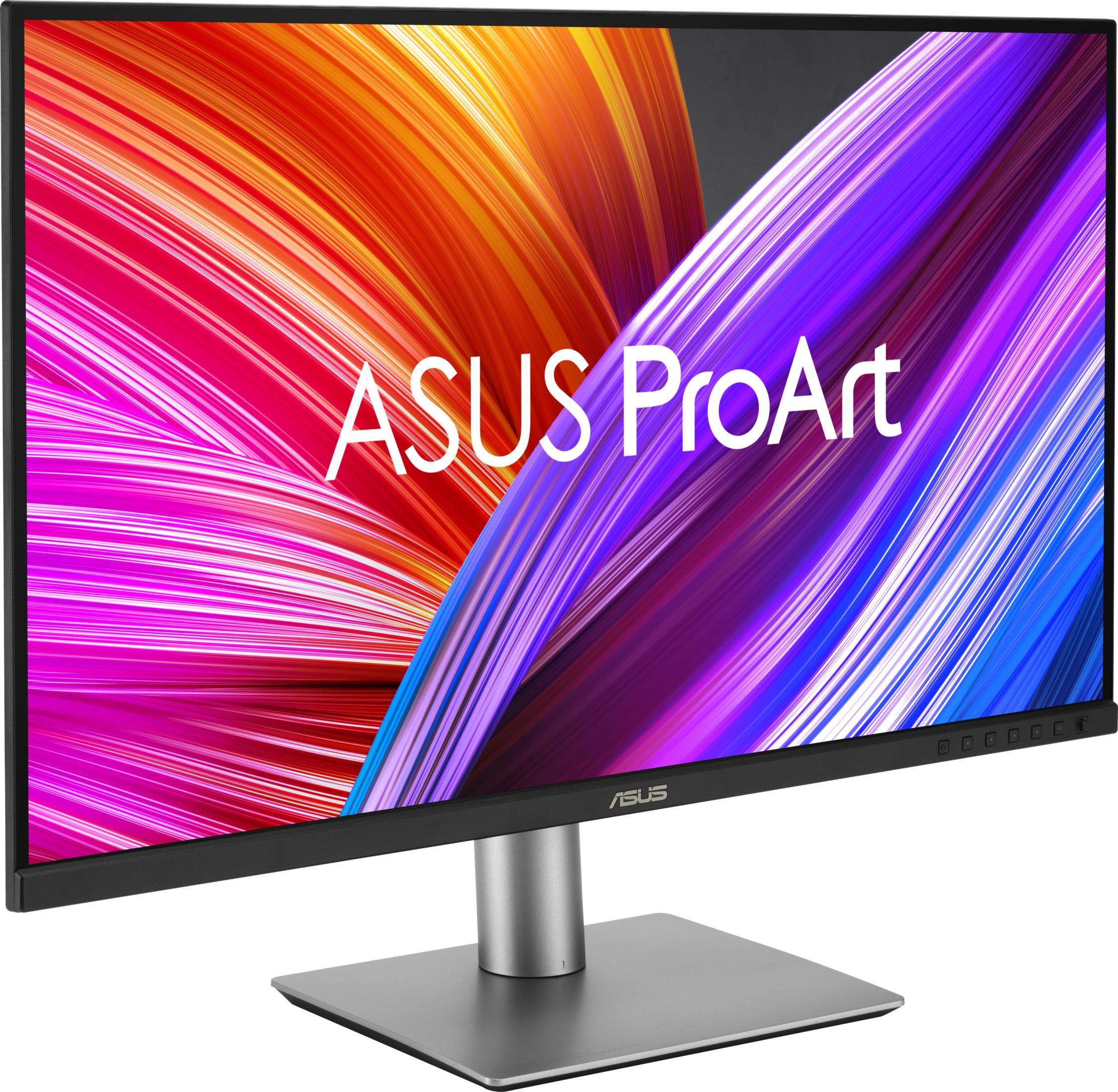 ASUS ProArt monitor displaying a colorful, abstract background with a silver stand.