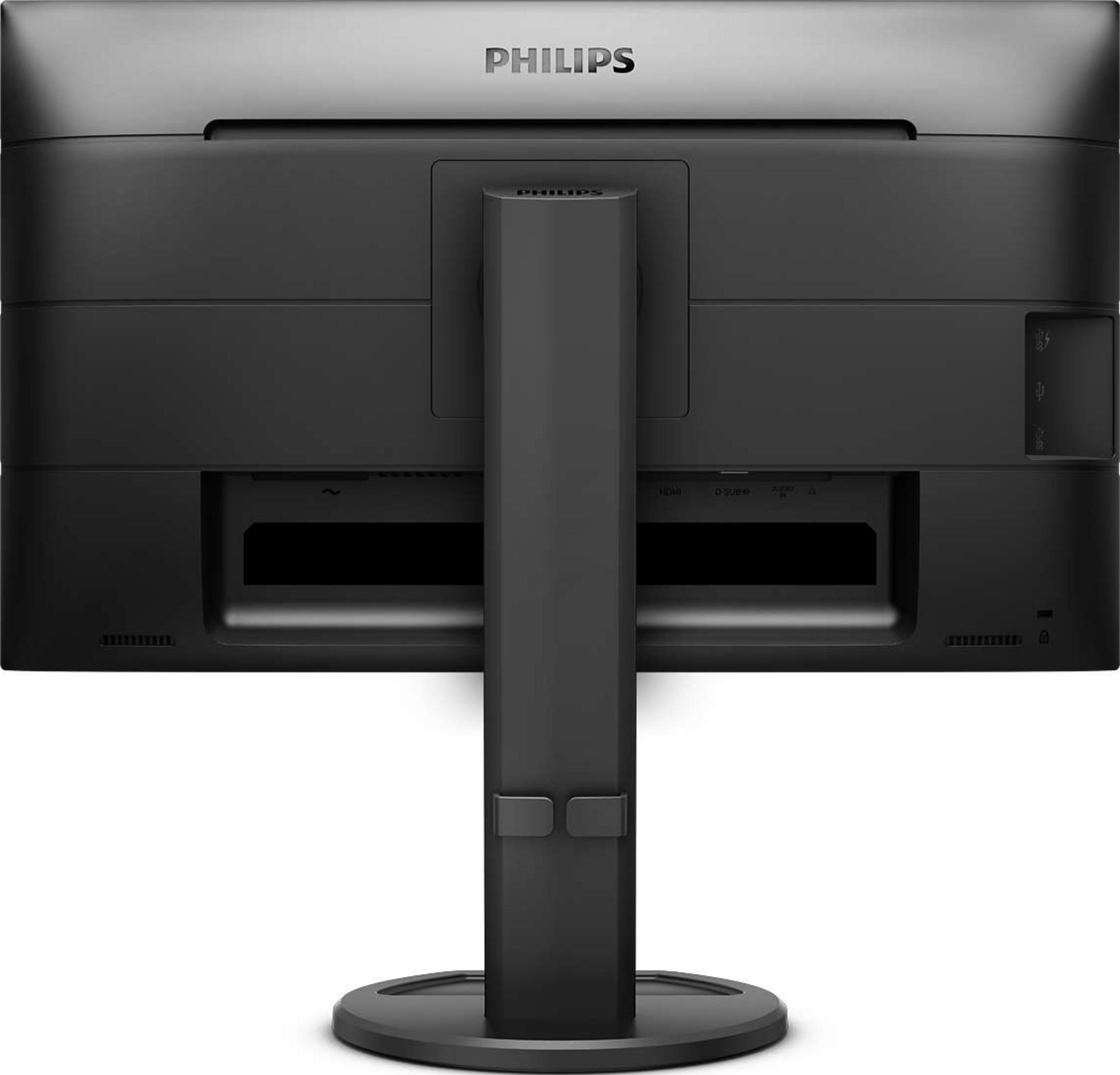 Widok z tyłu czarnego monitora Philips z podstawą i widocznymi portami.