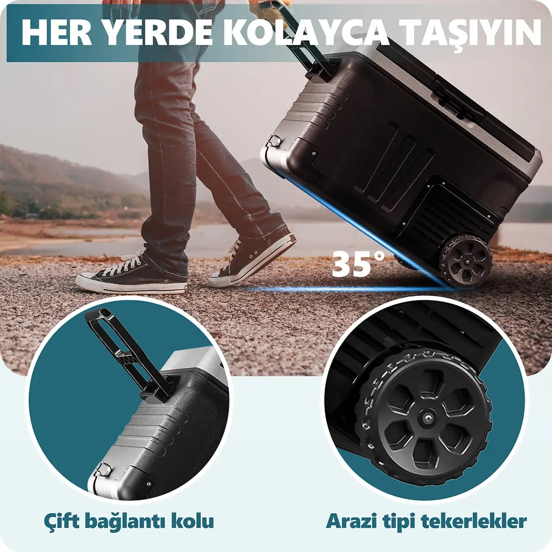 Bir kişi dışarıda tekerlekli ve saplı büyük siyah soğutucu kutuyu çekiyor.