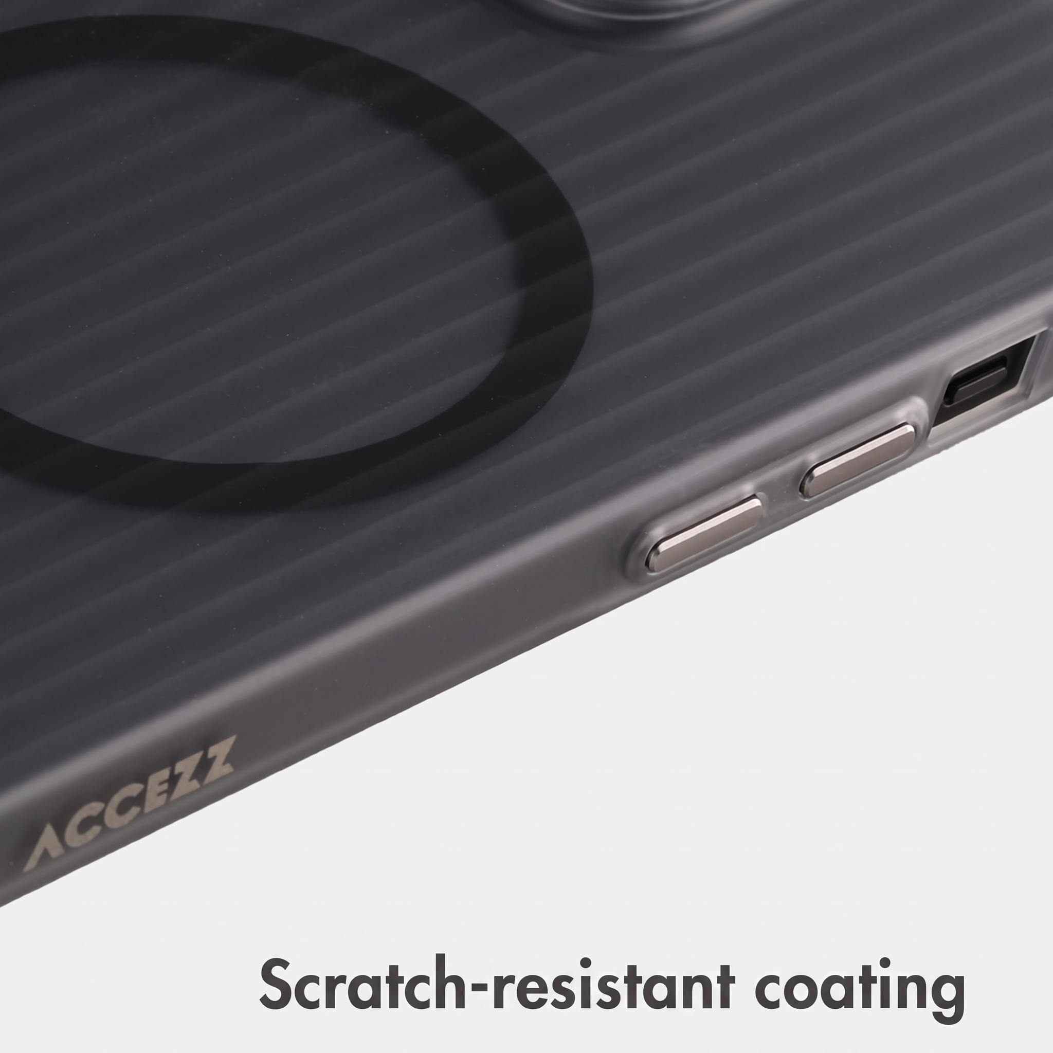 Dark grey phone case with ribbed design, magnetic circle, and side buttons.