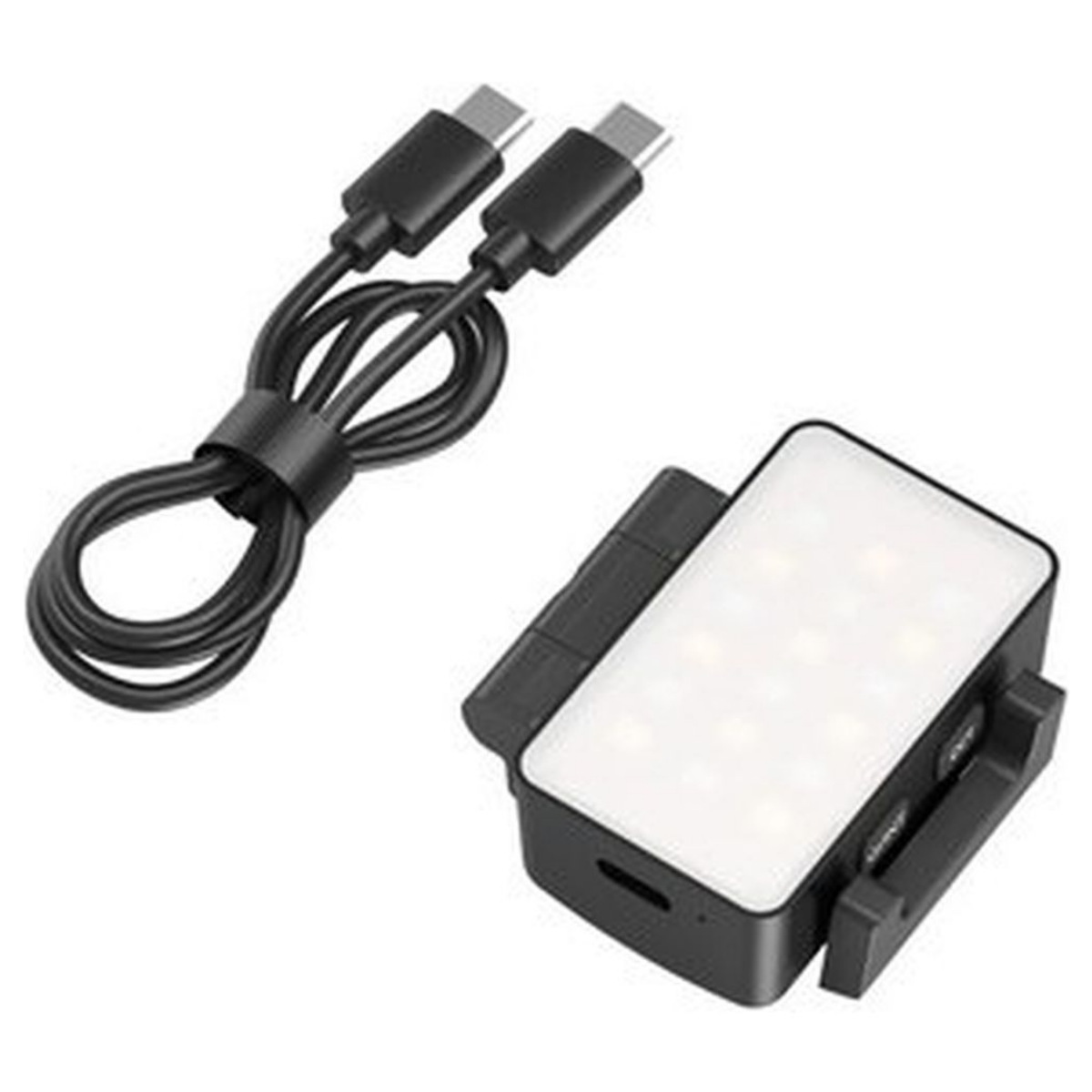 Schwarzes LED-Licht mit weißer Vorderseite und ein USB-C-Kabel auf weißem Hintergrund.
