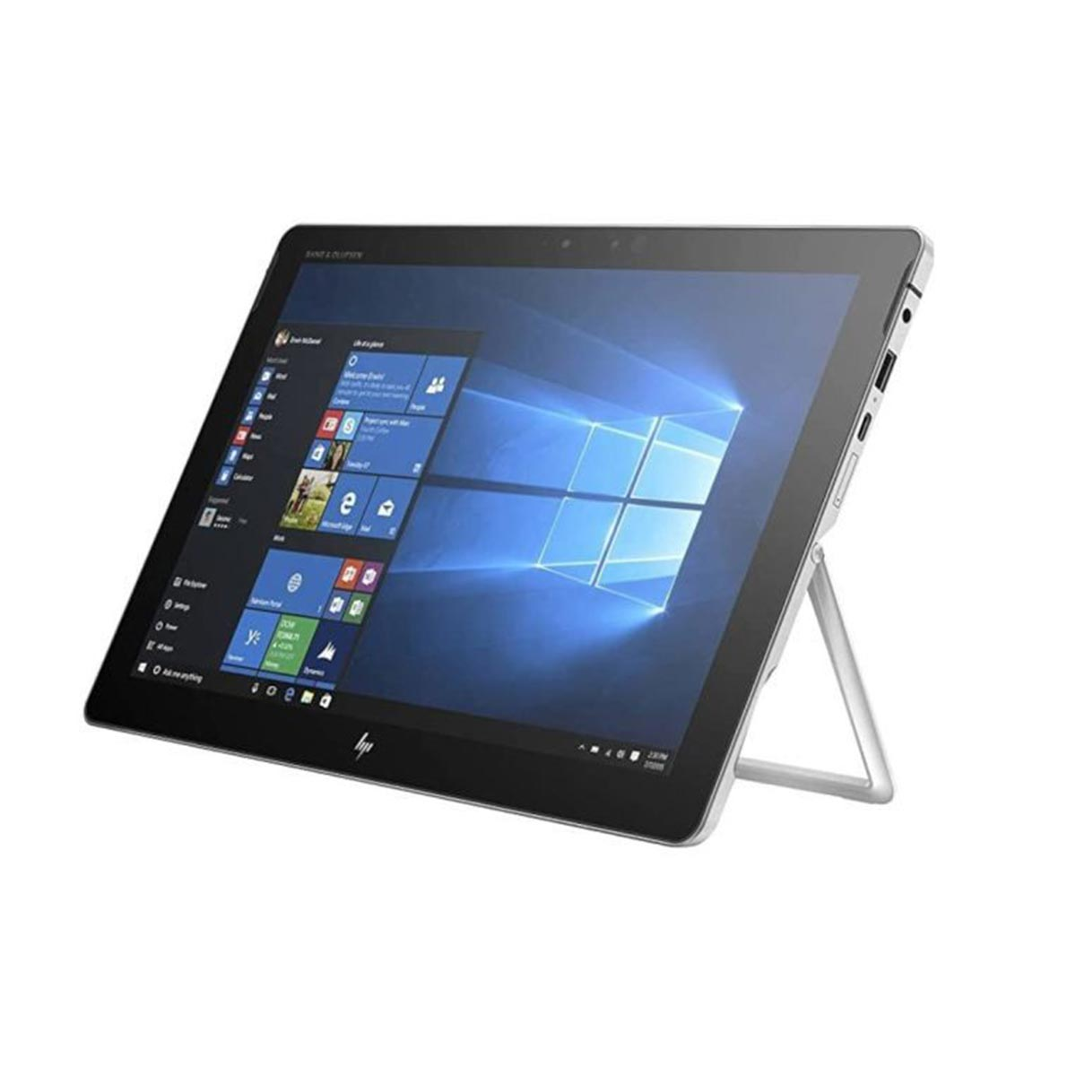 Srebrny tablet z wbudowaną podstawką i pulpitem systemu Windows na ekranie, na białym tle.