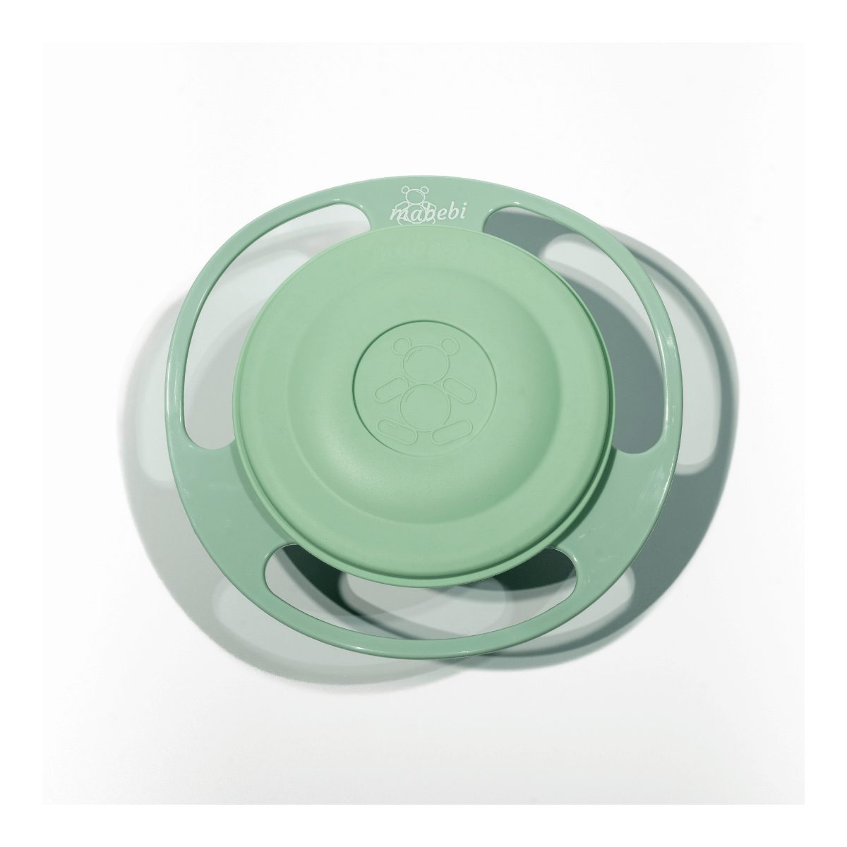 Grüne, gyro-stabilisierte Kinderschüssel mit Deckel und Bärenlogo auf weißem Hintergrund.