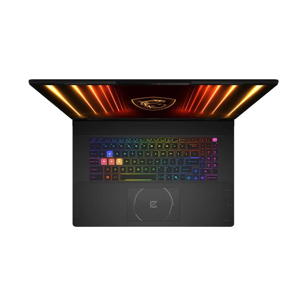 Widok z góry na czarny laptop z podświetlaną klawiaturą RGB i złotym logo na ekranie.