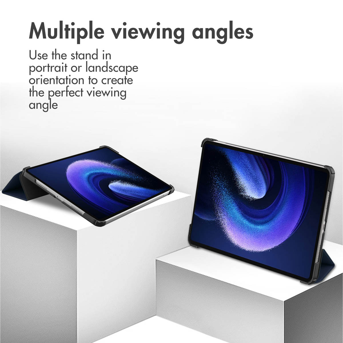 Two tablets in stands on white pedestals show different viewing angles.