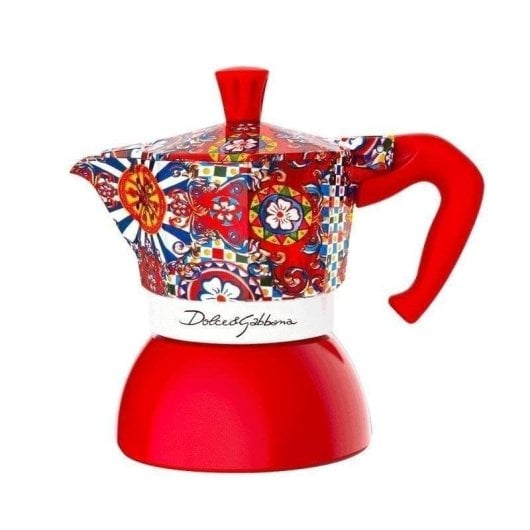 Caffettiera moka rossa e bianca Dolce & Gabbana con motivo floreale colorato.