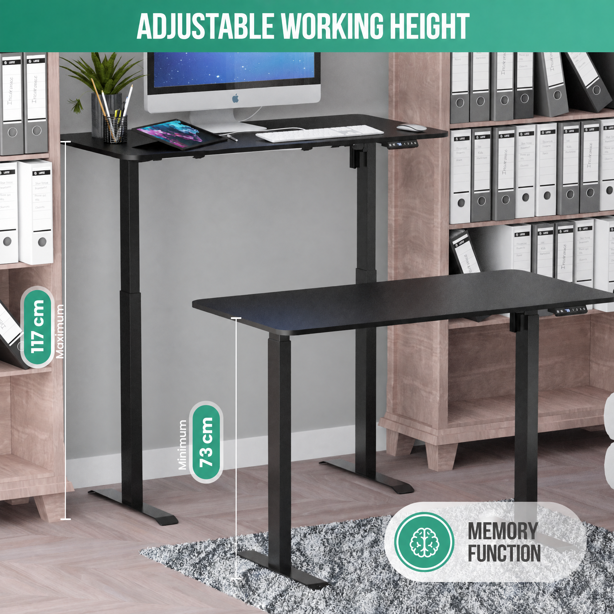 Two black adjustable standing desks with a computer, keyboard, and bookshelves in the background.