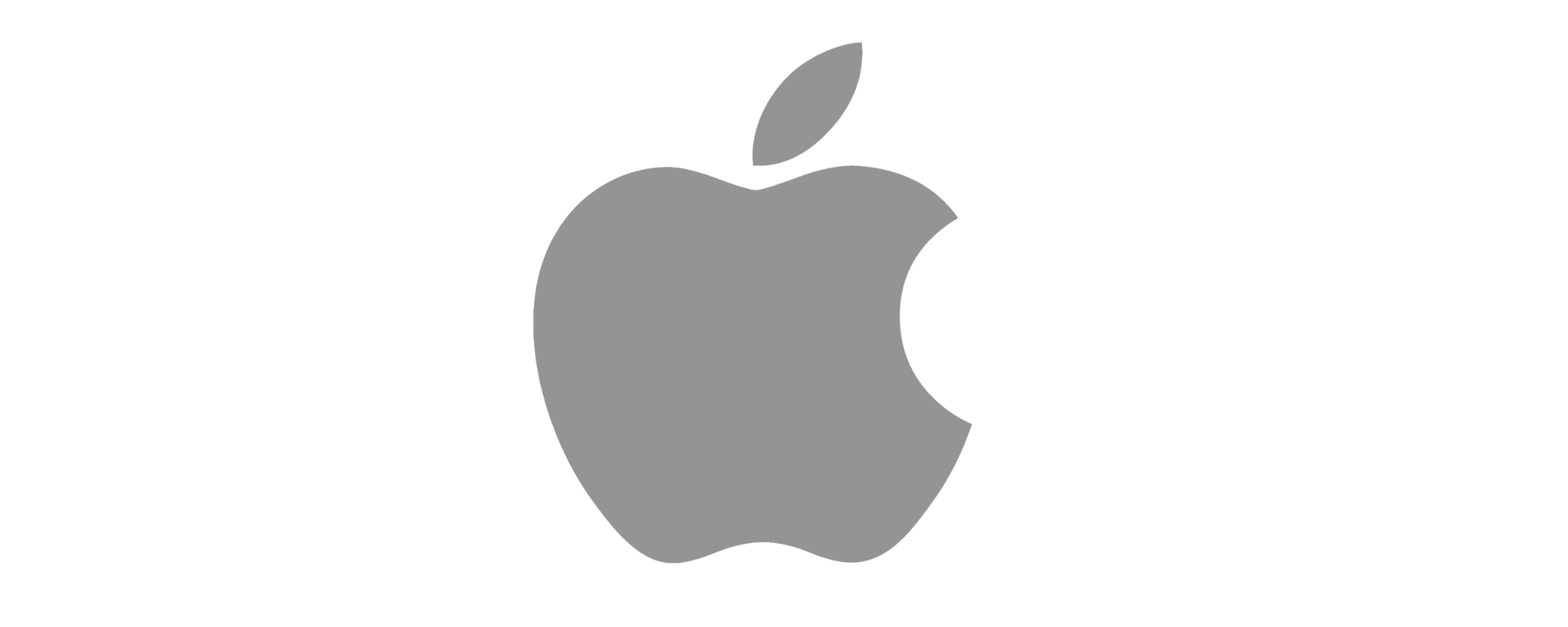 Szare logo Apple na białym tle z nadgryzieniem po prawej stronie i liściem u góry.