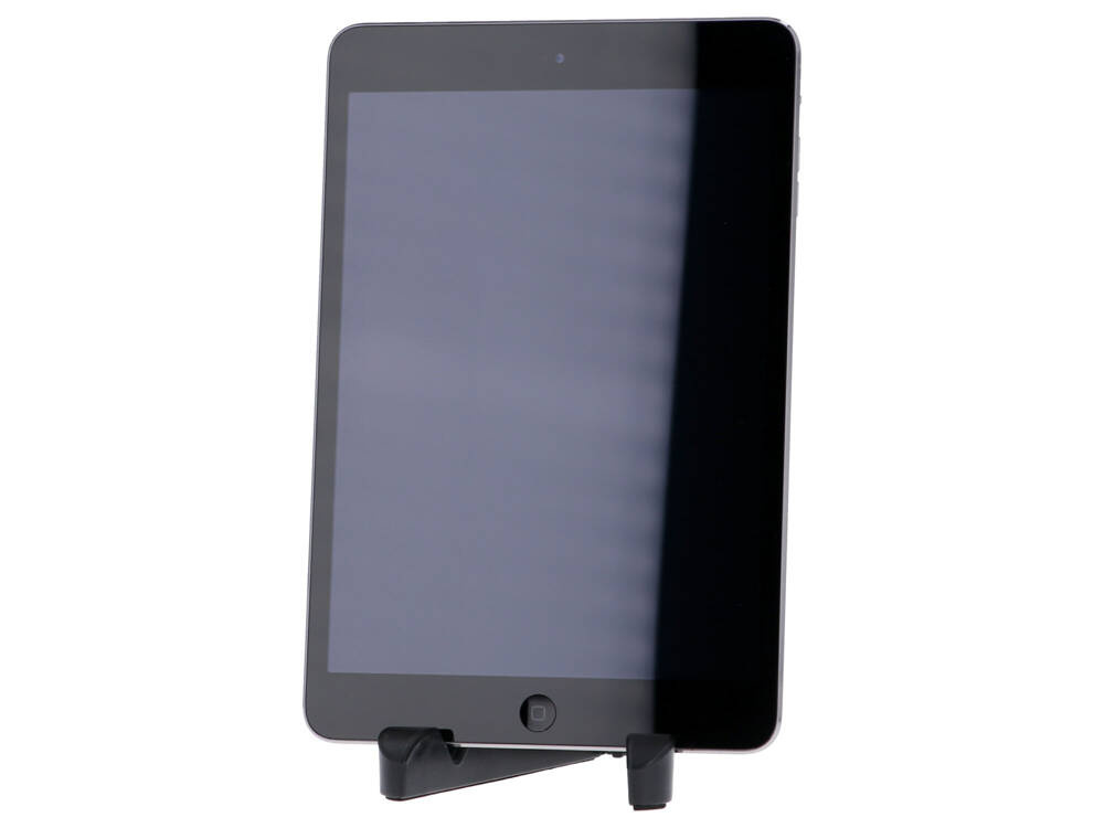 Czarny tablet spoczywa pionowo na małym czarnym stojaku na białym tle.