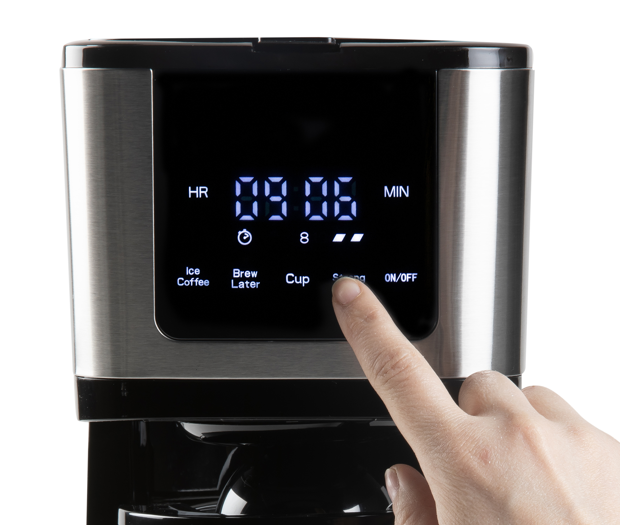 A finger presses a button on a modern silver and black coffee maker digital display showing 09:06.