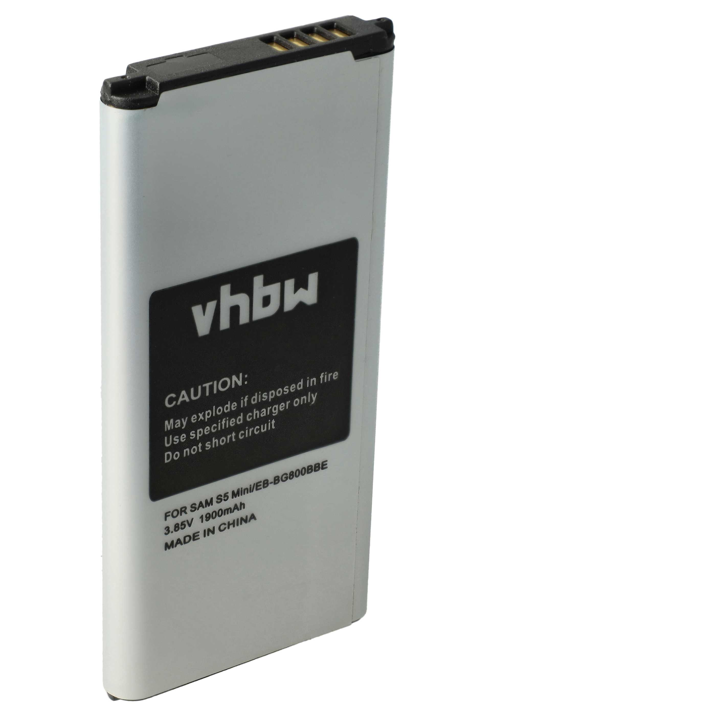 Silberne VHBW-Handybatterie mit schwarzem Etikett und Warnhinweisen gegen hellen Hintergrund.