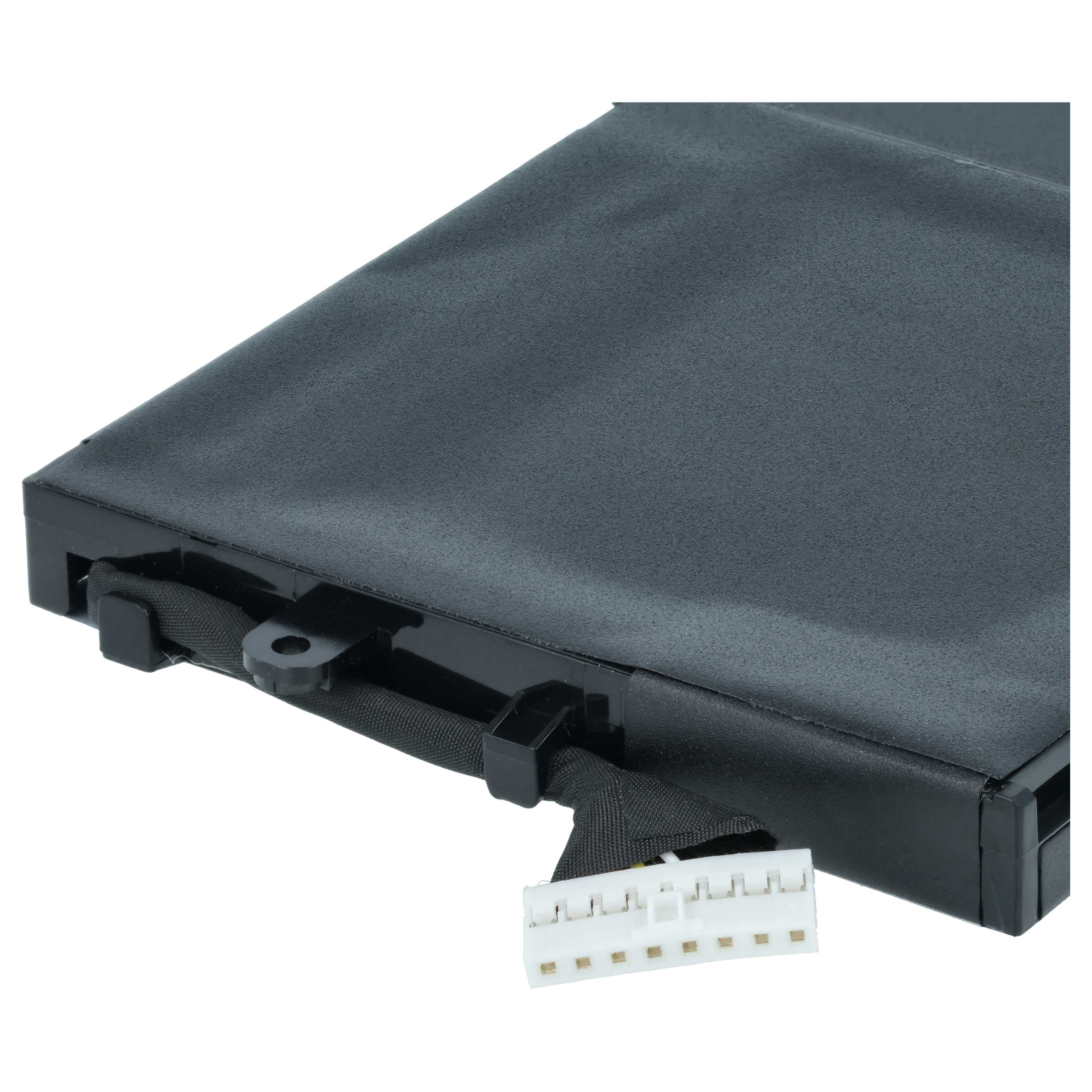 Ein schwarzer Laptop-Akku mit einem angeschlossenen weißen Steckverbinder und Kabel.