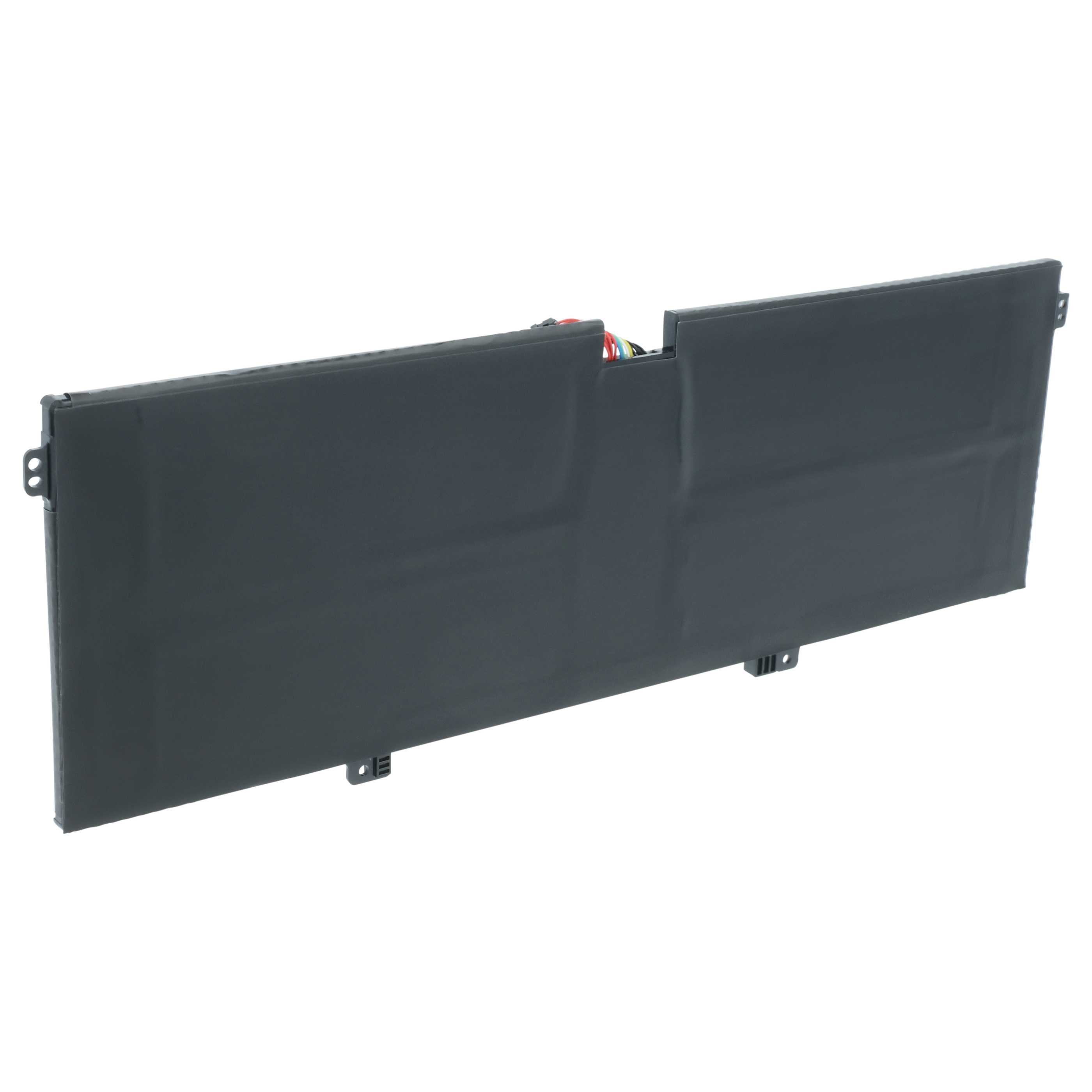 Eine rechteckige, schwarze Laptop-Batterie mit kleinen Anschlüssen und Kabeln oben.