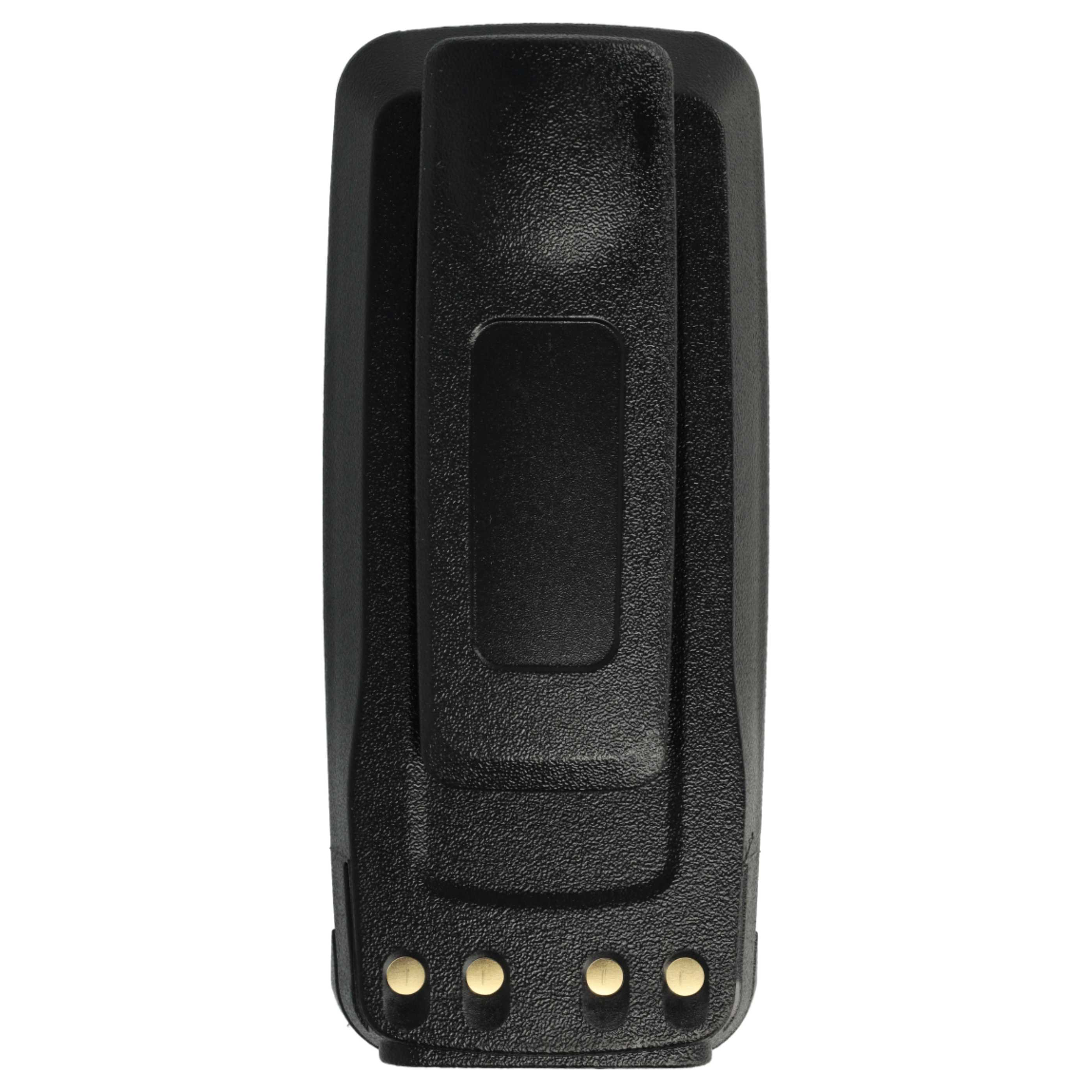 Ein schwarzer Gürtelclip mit vier goldenen Kontakten an der Unterseite auf weißem Hintergrund.
