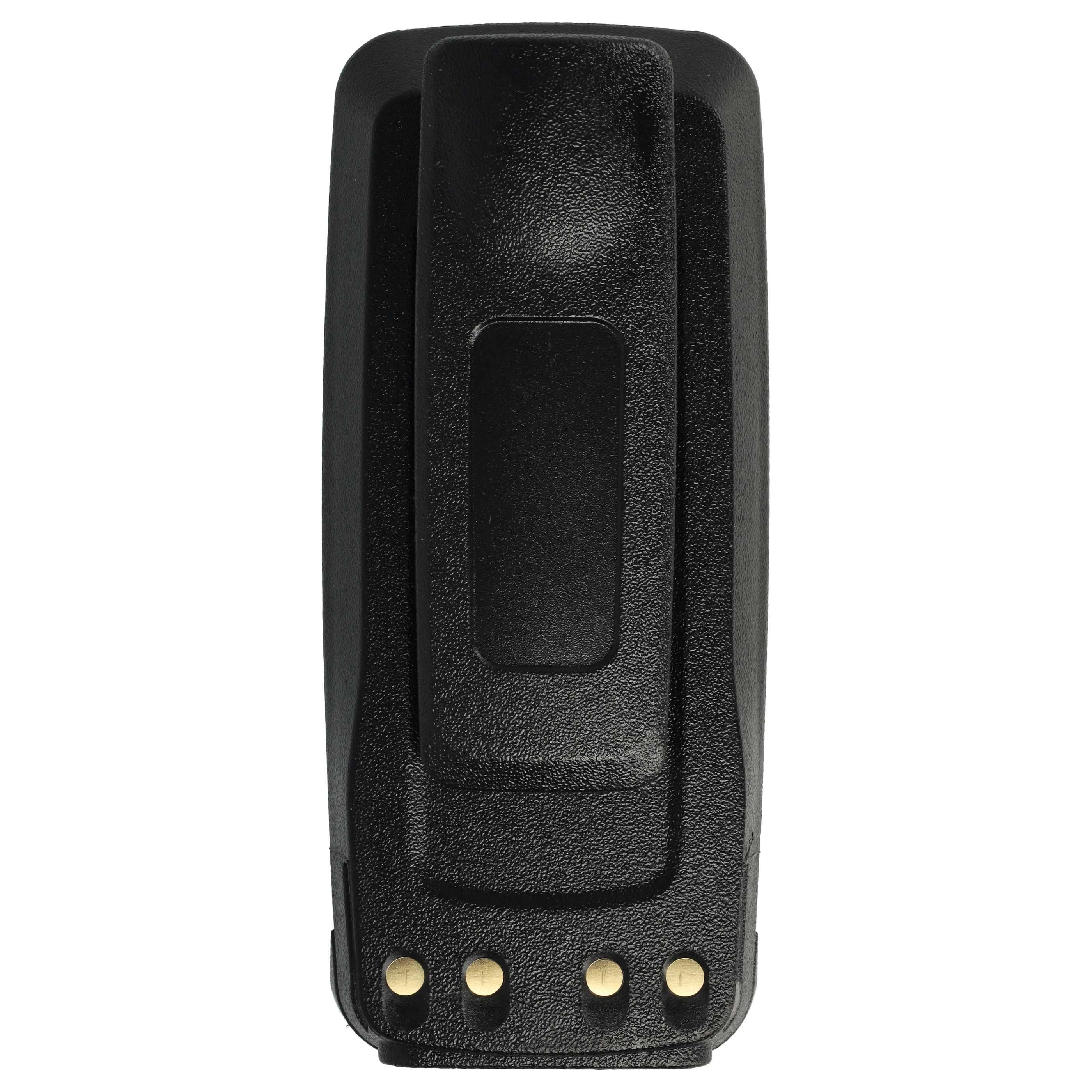 Schwarzes Plastikgerät mit vertikalem Clip und vier goldenen Kontakten unten vor weißem Hintergrund.