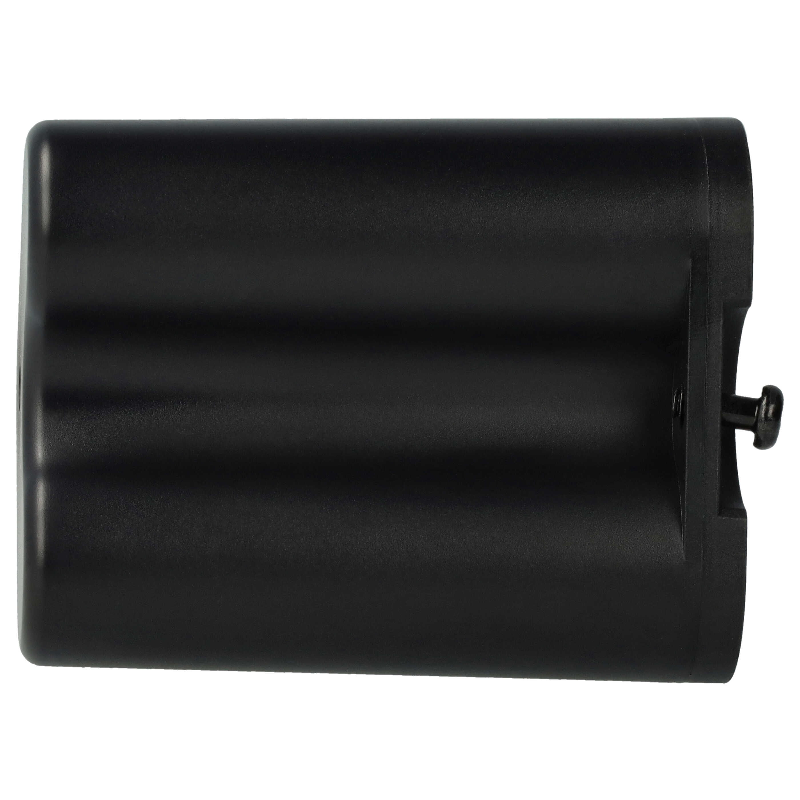 Ein schwarzes Batteriegehäuse aus Plastik mit einem hervorstehenden Pin an der Seite.