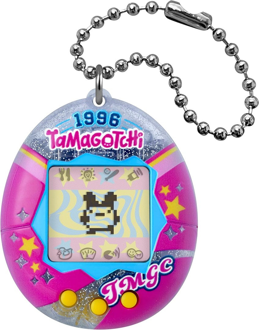 Różowy brelok Tamagotchi z pikselowym zwierzakiem na ekranie i łańcuszkiem.