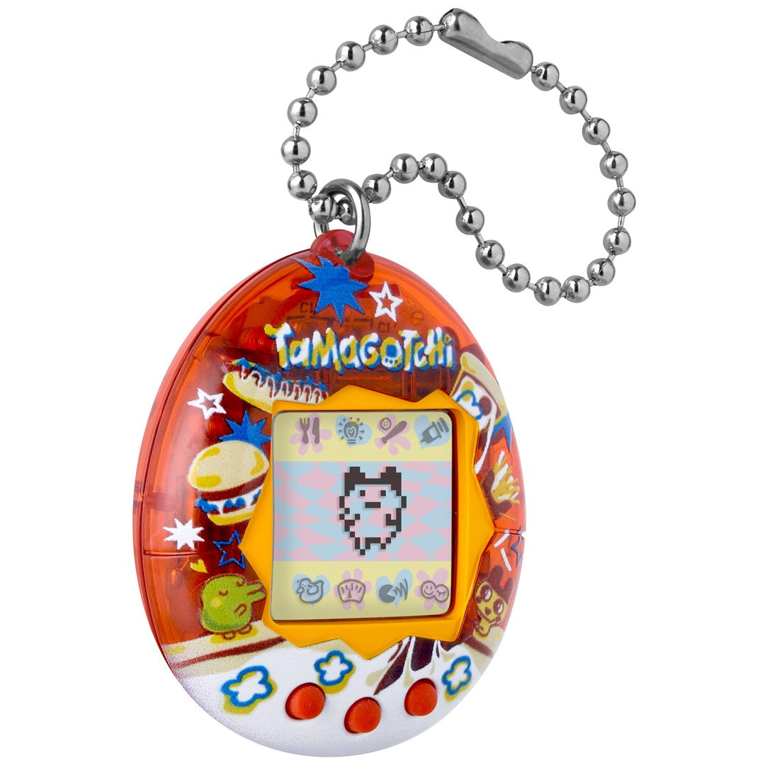 Pomarańczowo-białe Tamagotchi z cyfrowym zwierzakiem na ekranie i łańcuszkiem kulkowym.